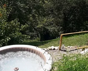 Outdoor heated bath tub